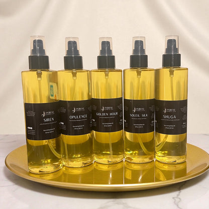 Five bottles of Jonrese Candle Co. Skincare products on a gold tray with a white background